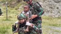 Sehat Bersama Masyarakat, Satgas Yonif/Mtl Ajak Olahraga Bersama Masyarakat