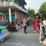 Polsek Widang Pengamanan Karnaval HUT KEMERDEKAAN RI KE-80 Desa Patihan