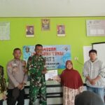 Babinsa Koramil 1008-04/Tanta Dampingi Penyaluran BLT di Desa Lok Bayur