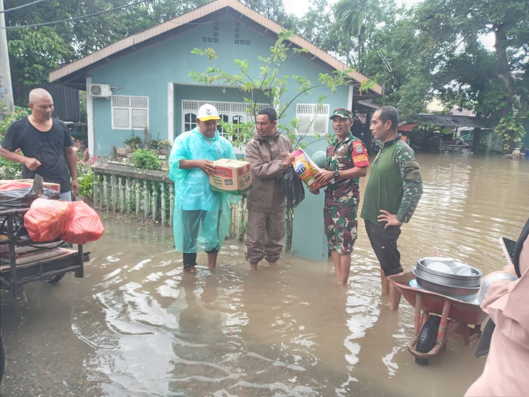 Prajurit Kodam IM Sigap Selamatkan Warga Aceh dari Banjir dan Longsor
