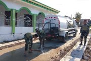 IMG-20260810-WA0092 Menjaga Asa di Depan Rumah Ibadah: Kala Satgas TMMD 129 Bojonegoro Setia Merawat Jalan Desa Kesongo