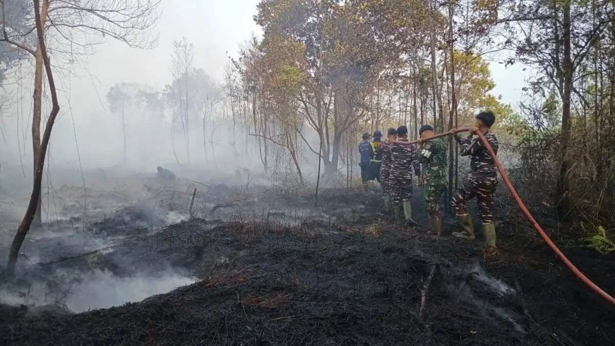 Maksimalkan Pemadaman Karhutla dengan Hujan di Riau Maksimalkan Pemadaman Karhutla dengan Hujan di Riau